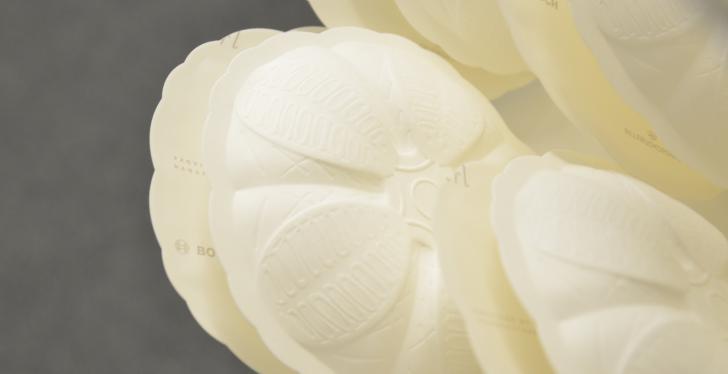 White packaging in the form of pearl shells; copyright: Bosch...