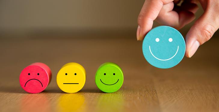 Four colorful smileys, from unhappy to smiling; copyright:...