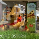 Two large Lindt chocolate bunnies in a shop window....