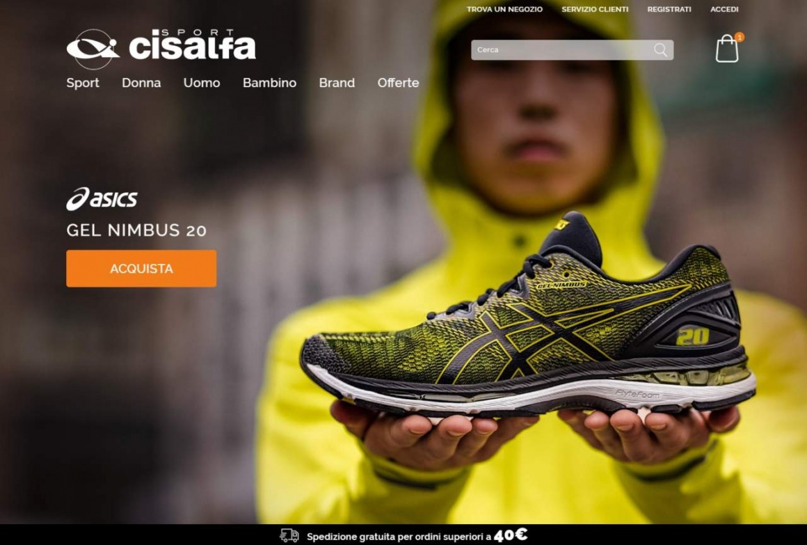 Screenshot of Website showing man holding a sports shoe...