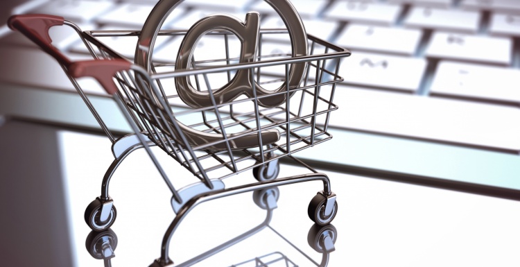 Photo: Small shopping cart carrying at symbol; copyright: panthermedia /...