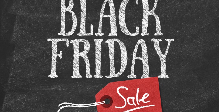 Photo: White Black Friday lettering on black board with red price tag;...