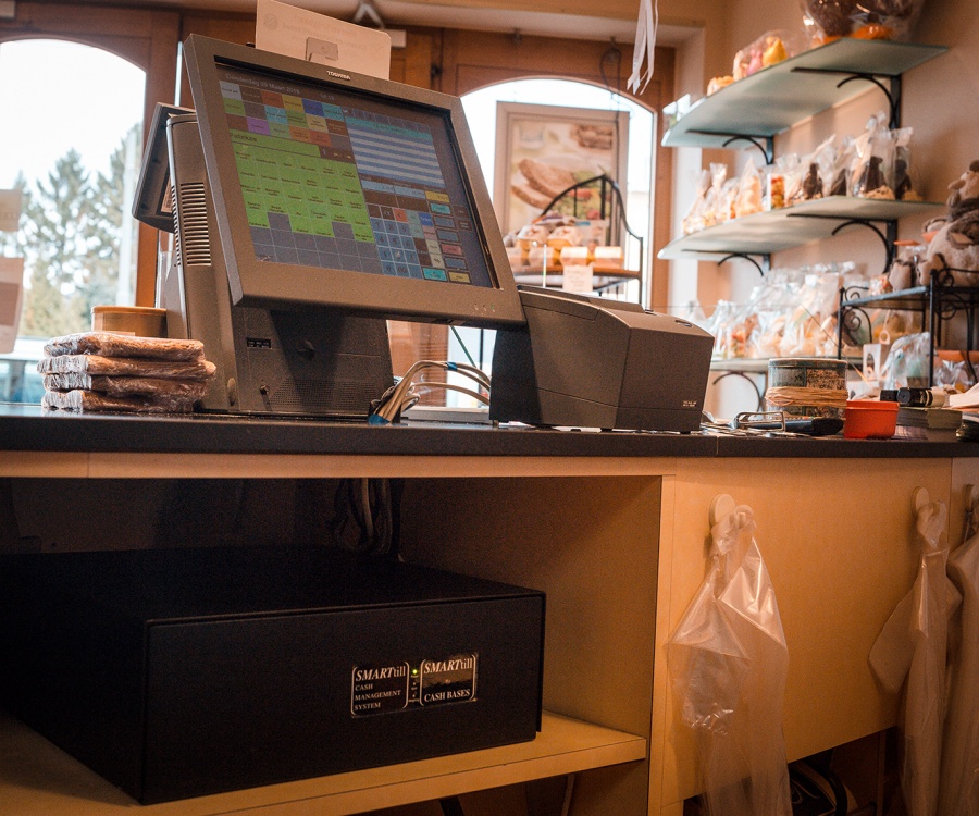 Photo: Technology speeds up service and cash counts at Antwerp bakery...