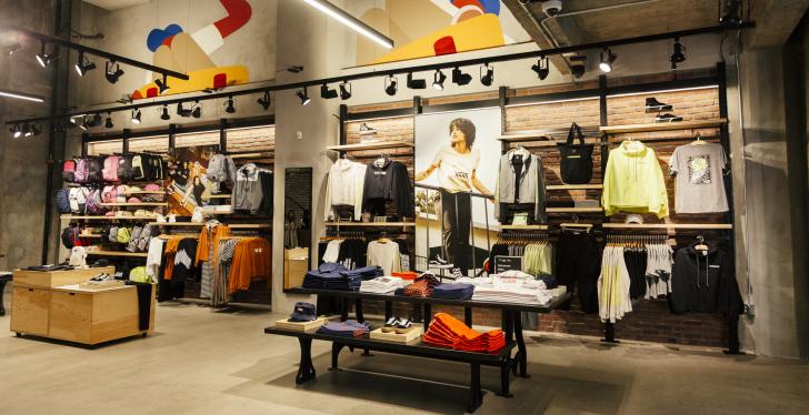 Inside of a modern fashion store with women’s clothing; copyright: Vans...
