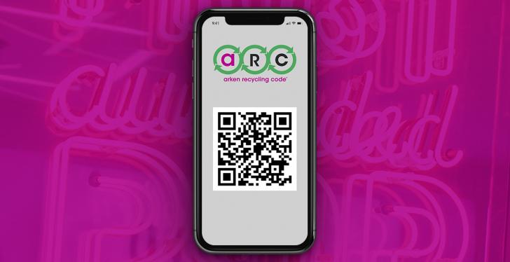 Smartphone shows the new QR-Code, purple background...