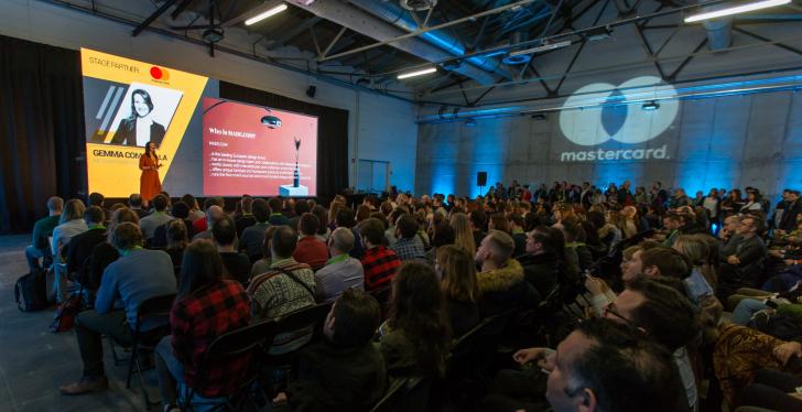 Audience listening to a presentation; Copyright: E-commerce Berlin Expo...