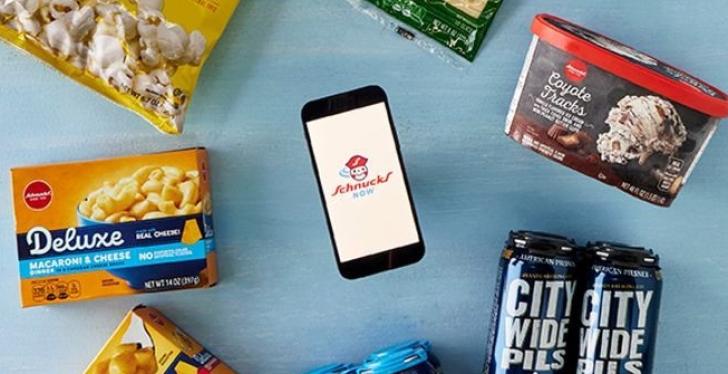 A phone with the Schnuck Now app opened between different sweets...