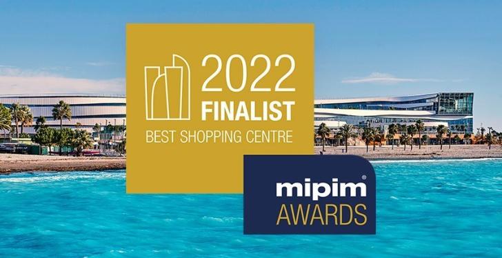 A logo with the words 2022 Finalist with the CAP3000 shopping centre by the sea...