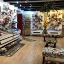 View into a colourfully decorated shoe shop