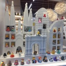 A white toy castle with rubber ducks in a shop window...