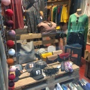 Shop window decoration with a wooden pallet with bags on it...