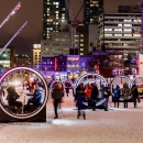 An installation with lighting in a public square in Montréal, Canada; people...