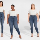 Four women in white shirts and blue jeans