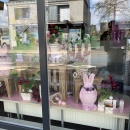 Shop window of a pharmacy, which is decorated with Easter decorations in the...