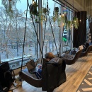 Special hanging chairs in front of the panorama window....