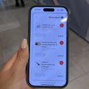 Smartphone shows shopping cart with three selected items: playing card and dice...