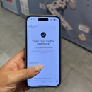 Smartphone shows order confirmation with order number and note that an e-mail...