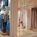 Mirrors on pink walls.