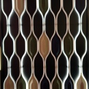 Abstract wall pattern made of white, curved LED light lines with coloured...