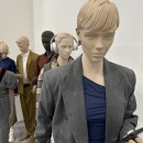 Modern mannequins wearing streetwear and headphones....