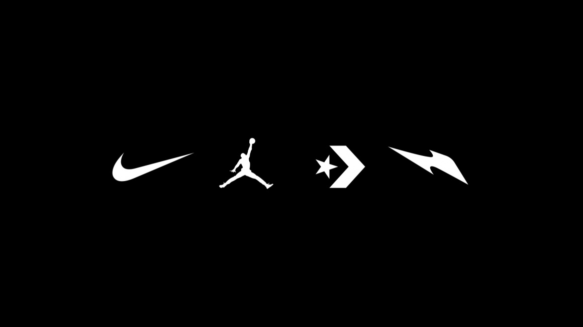 Four white symbols on a black background, the Nike logo among them...
