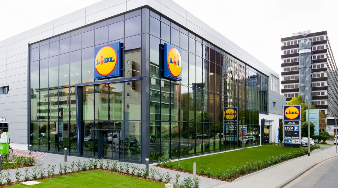 Exterior view of a Lidl store with a glass facade