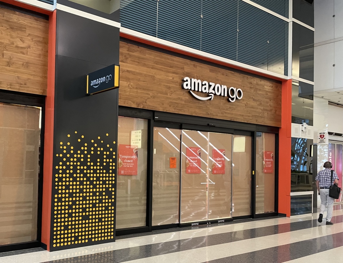 The storefront of a closed Amazon Go store in Chicago in a building...
