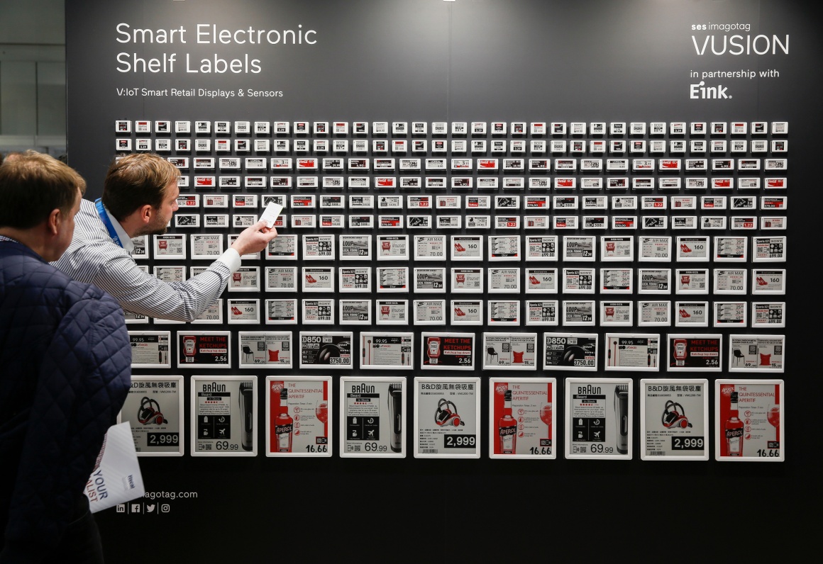 A wall with a variety of electronic price tags