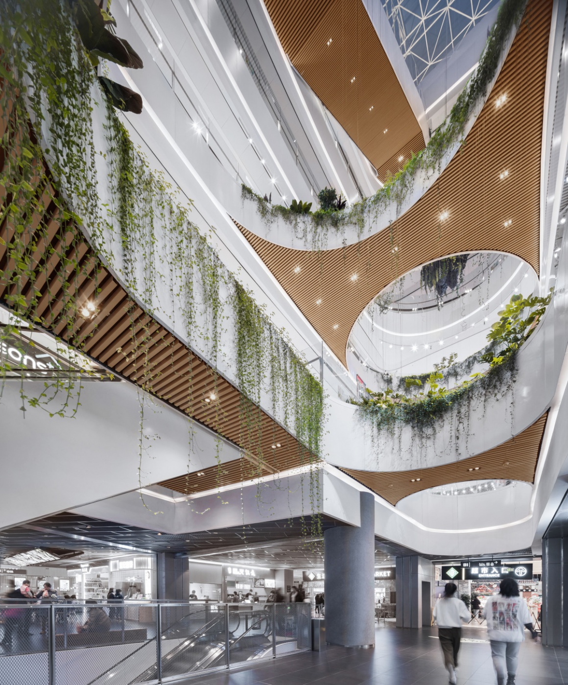 Shopping mall design with plants in Mongolia - iXtenso – retail trends