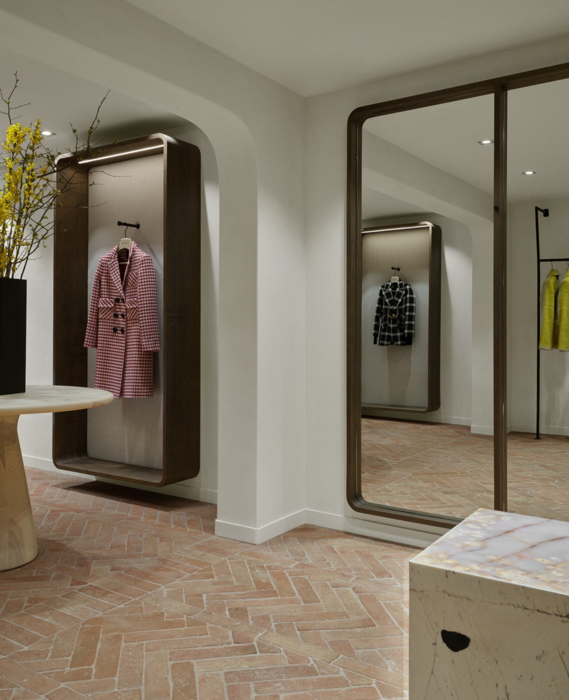 A newly designed fashion store of SMYTHE with floor to ceiling mirrors;...