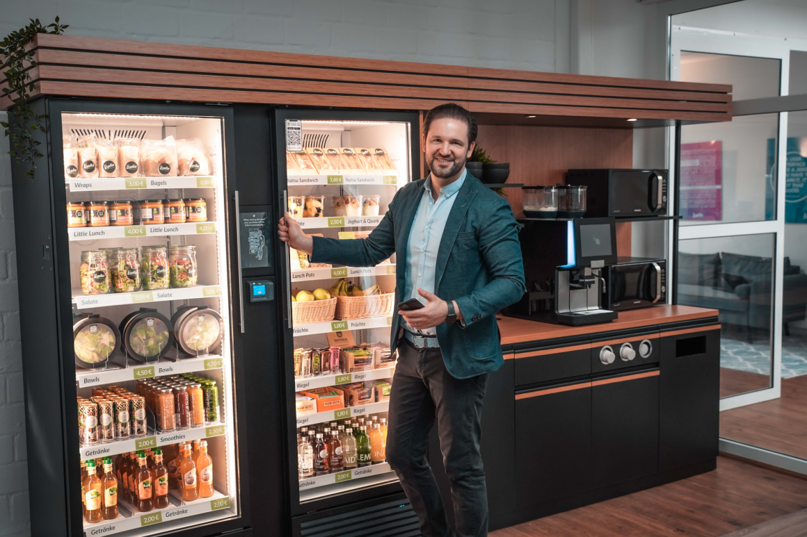 Alexander Eissing, Managing Director of Livello GmbH, at a vending machine...