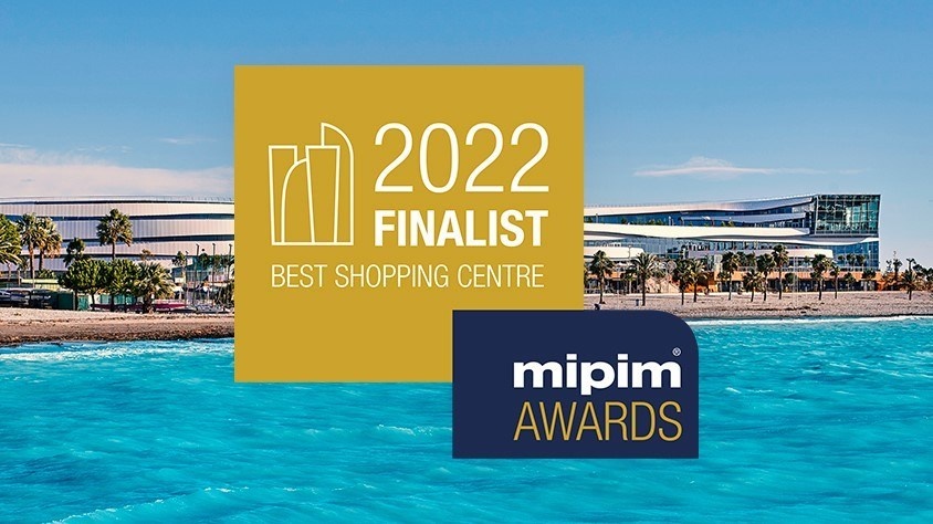 A logo with the words 2022 Finalist with the CAP3000 shopping centre by the sea...