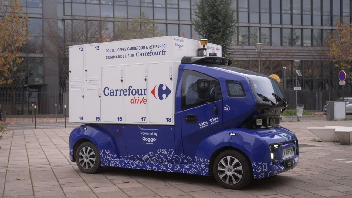 A blue delivery truck