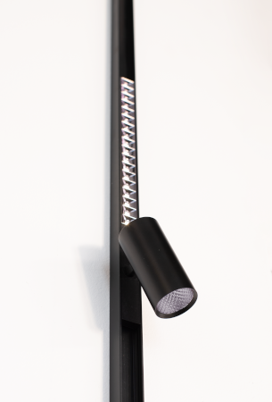A black spotlight on a mounting rod