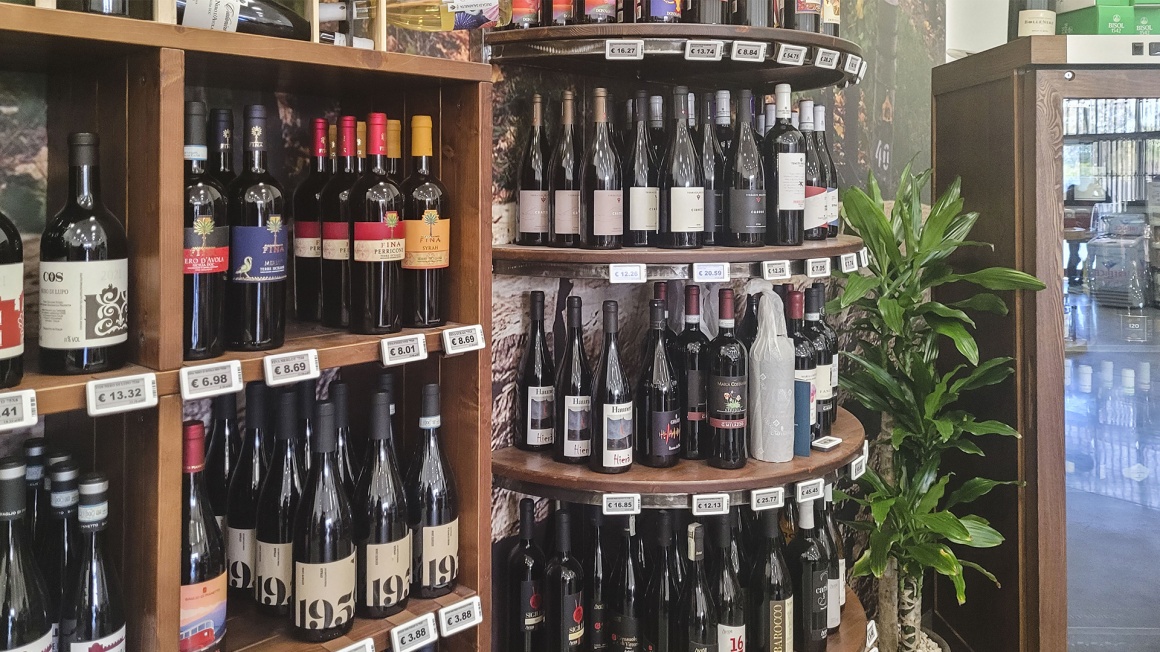 A wine rack with electronic shelf labels