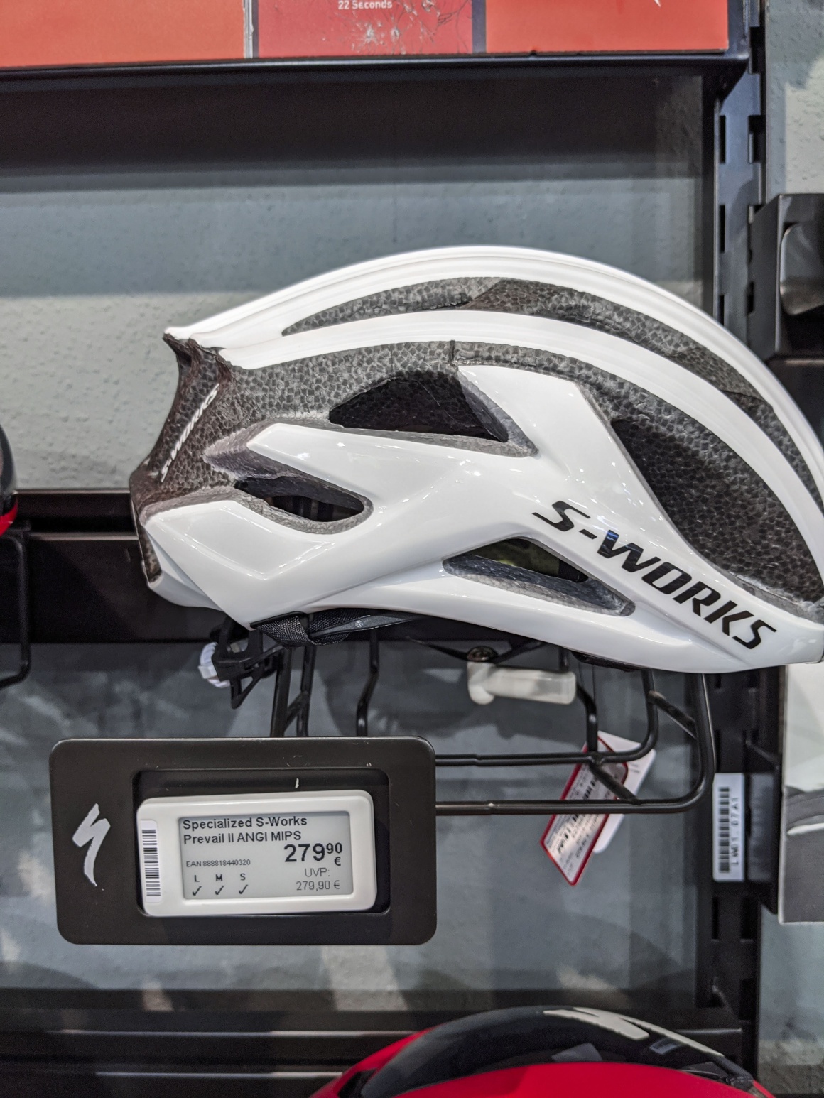 An electronic price tag on a bicycle helmet