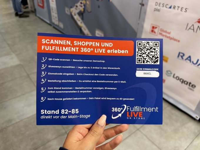 Hand holds an information card about the Fulfillment 360° LIVE Experience with...