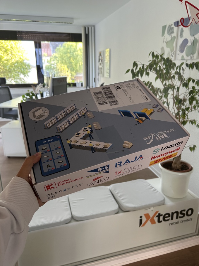 Shipping carton is presented in front of the iXtenso logo in the office....