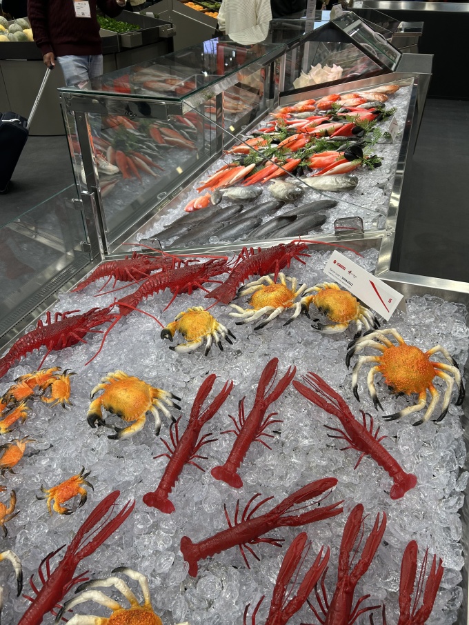 Fish and seafood displayed on ice.