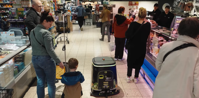 Robots in the store with customers