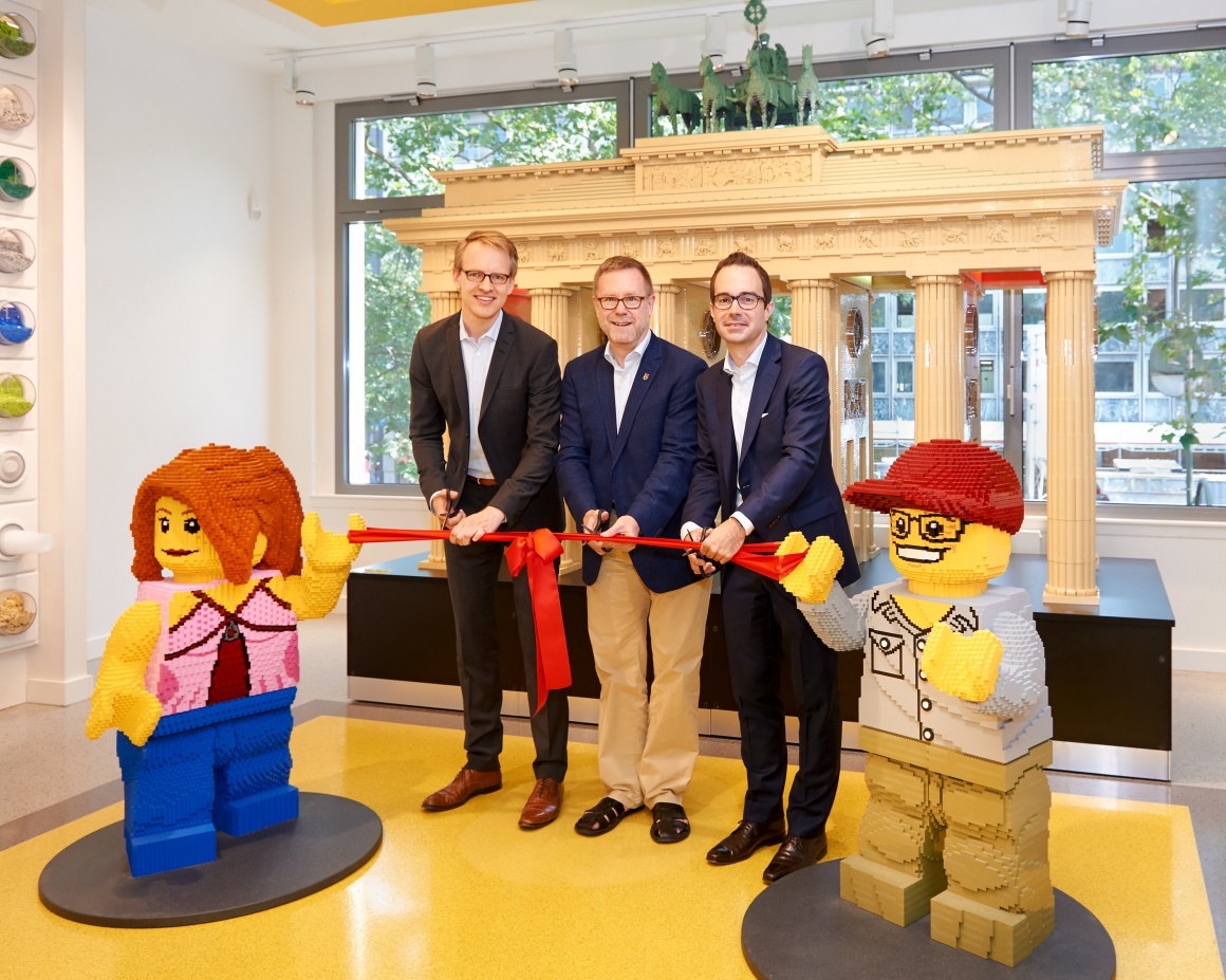 three men opening the store