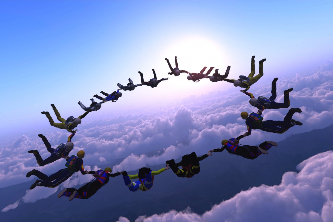 parachute jump of a team; Copyright: panthermedia.net/Iurii...