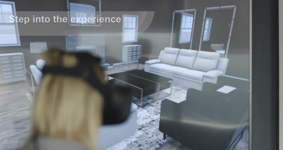 Woman with VR glasses looks at living room with furniture; copyright: Macys...