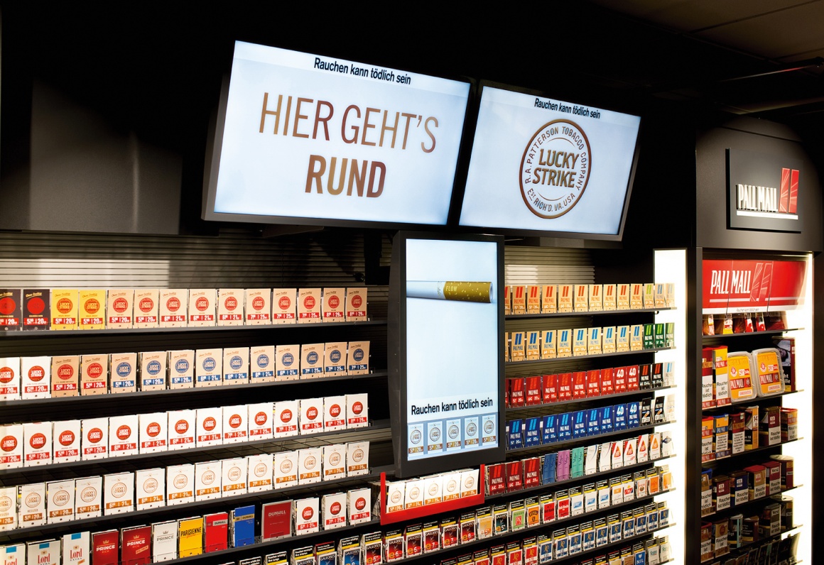 Digital Signage at a tobacco shelf; copyright: Westiform...