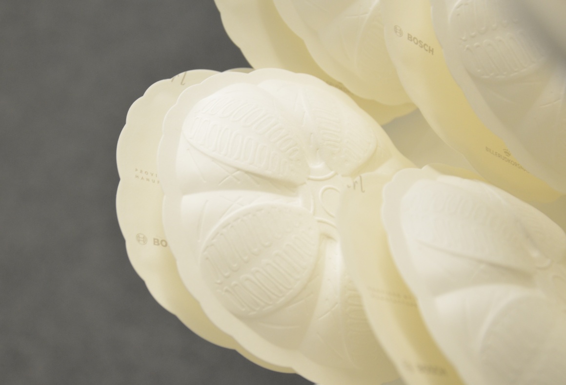 White packaging in the form of pearl shells; copyright: Bosch...