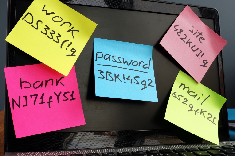Coloreful sticky notes with passwords on a screen