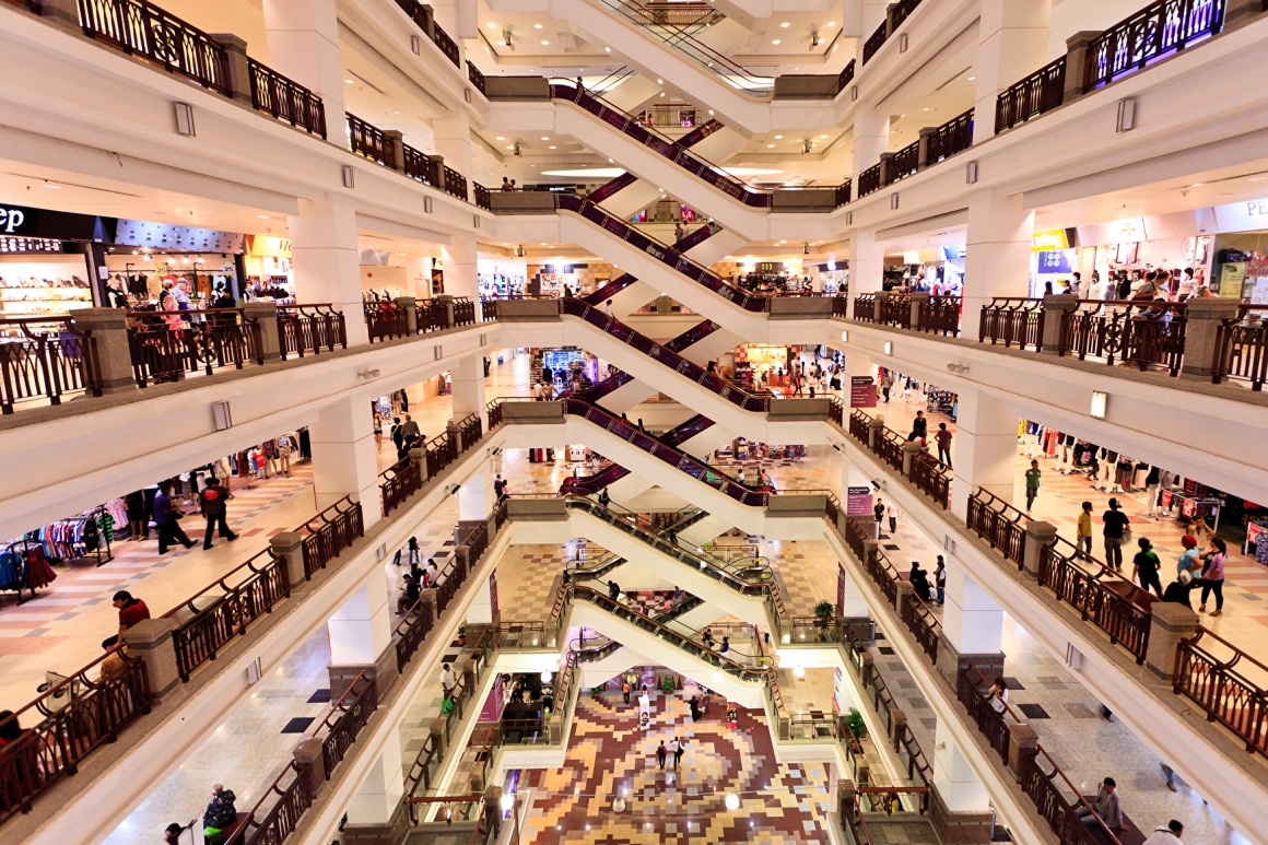 View into a huge shopping mall with several floors