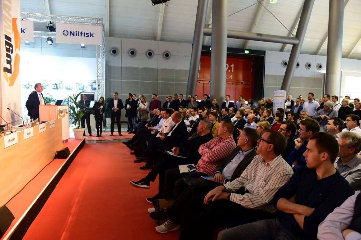 A stage and audience at LogiMAT