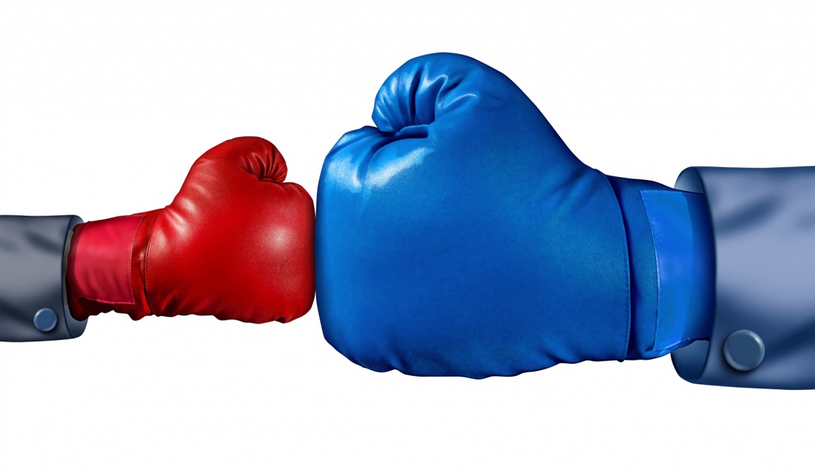A small red boxing glove against a big blue boxing glove...