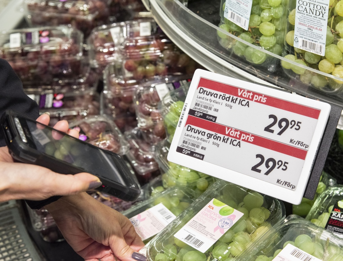 shows the electronic lable displaying the price of produce within a cooled...